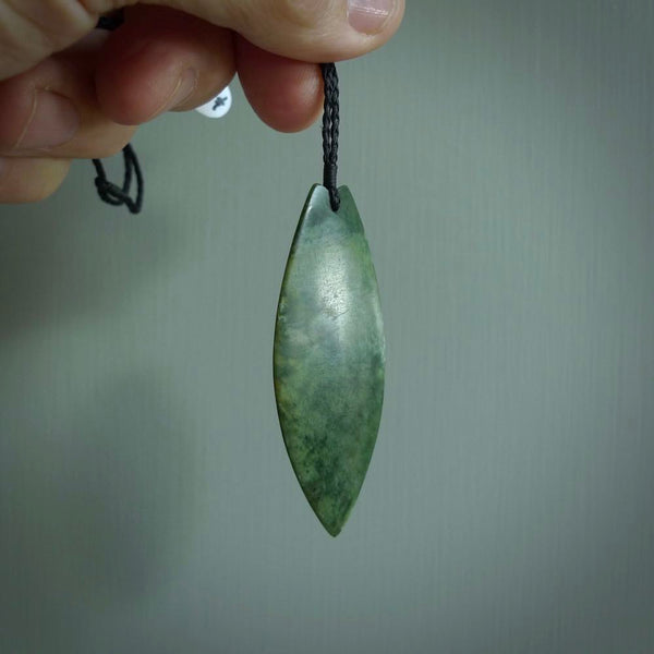 Hand carved New Zealand jade contemporary drop pendant. Hand carved in New Zealand by Darren Hill, jade artist, for NZ Pacific. One only, unique drop necklace with black adjustable cord. Free shipping worldwide.