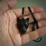 This pendant is a hand carved puma. We've carved this from a lovely piece of black jade and we provide it with a hand plaited cord. Shipping is free worldwide.