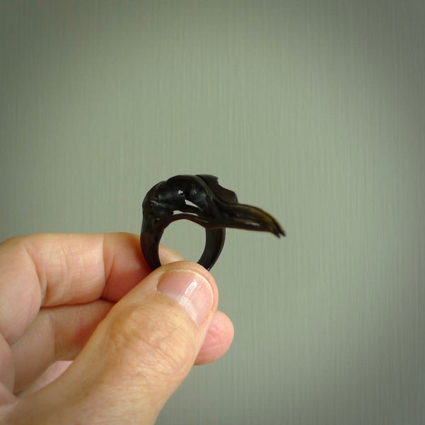 Hand carved buffalo horn bird skull skeleton ring. Back Buffalo horn ring with bird skull skeleton design. Hand made ring, delivered with express courier. Postage is included. One only bone ring.