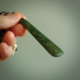 A hand carved large New Zealand Jade drop, roimata, necklace. The cord is a black colour and is a fixed length. A large sized hand made drop necklace by New Zealand artist Kerry Thompson. One off work of art to wear.