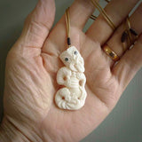 Hand carved tiki. Tiki Pendant made from cow bone by NZ Pacific. Ethnic handcarved jewellery for sale online.
