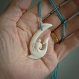Hand carved bone hook with turtle. This is a marine-themed pendant which we have made for turtle lovers and for those of us that love the sea. This piece is handcarved from natural bone and is shipped worldwide free.