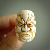 Hand carved Ni-Oh mask ring. Made from Red Deer antler in New Zealand. Unique Ni-Oh Mask ring hand made from deer antler by master bone carver Fumio Noguchi. Spectacular collectable work of art, made to wear. One only ring, delivered to you at no extra cost with express courier.