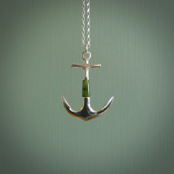 ANCHORED BY ME  A beautifully carved anchor for lovers of the ocean!  We have hand made this in New Zealand Jade paired with beautiful Sterling Silver.   A wonderful, mottled green stone with dark inclusions - the look of a well-used anchor.