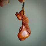 Hand carved stained bone female pendant. Made from natural bone. Bone jewellery from the Pacific for sale online. Female pendant for men and women.