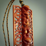 This large piece is a hand carved traditional stained bone pendant. Yuri Terenyi has carved this from Natural Bone. It is a beautiful and artistic piece of jewellery. One only necklace.