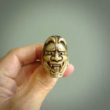 Hand carved Hannya mask ring. Made from Red Deer antler in New Zealand. Unique Hannya Play Mask ring hand made from deer antler by master bone carver Fumio Noguchi. Spectacular collectable work of art, made to wear. One only ring, delivered to you at no extra cost with express courier.