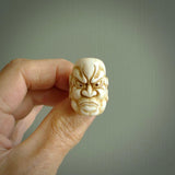 Hand carved Ni-Oh mask ring. Made from Red Deer antler in New Zealand. Unique Ni-Oh Mask ring hand made from deer antler by master bone carver Fumio Noguchi. Spectacular collectable work of art, made to wear. One only ring, delivered to you at no extra cost with express courier.