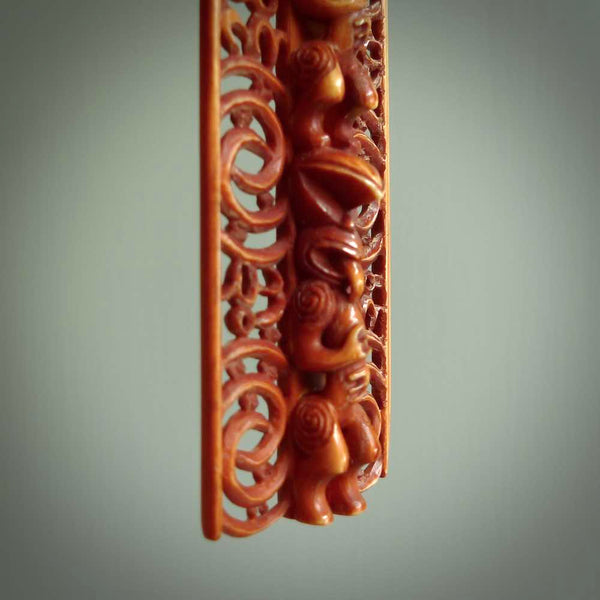 This large piece is a hand carved traditional stained bone pendant. Yuri Terenyi has carved this from Natural Bone. It is a beautiful and artistic piece of jewellery. One only necklace.