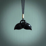 Hand carved black jade whaletail design. Whaletail koru pendant. Hand made jade jewellery for sale online.