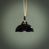 Hand carved black jade whaletail design. Whaletail koru pendant. Hand made jade jewellery for sale online.