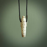 Essential oil dispenser. Hand carved bone urn. Used to dispense essential oils. Bone jewellery hand made in New Zealand by NZ Pacific. This is a lovely necklace made for lovers of essential oils.