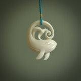 A hand carved bone whale pendant. This is a lovely piece carved to bring pleasure to the lucky wearer. It is a friendly pendant which we will ship to you free wherever you live. Carved by NZ Pacific and for sale online.