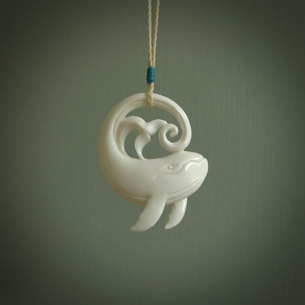 A hand carved bone whale pendant. This is a lovely piece carved to bring pleasure to the lucky wearer. It is a friendly pendant which we will ship to you free wherever you live. Carved by NZ Pacific and for sale online.