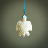 Hand carved white onyx turtle pendant. Unique handmade jewellery for sale online. Carved by NZ Pacific - moana jewellery.