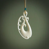 Hand carved bone koru pendant. Carved for NZ Pacific by Yuri Terenyi. Unique bone jewellery for sale online.