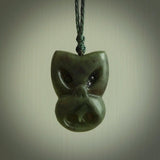 Hand carved New Zealand Jade Pounamu Wheku face pendant. Carved from New Zealand Jade by NZ Pacific. Hand crafted Jade jewellery for sale online. Pacific carving pendant, striking and unique delivered to you with Express Courier at no extra cost.