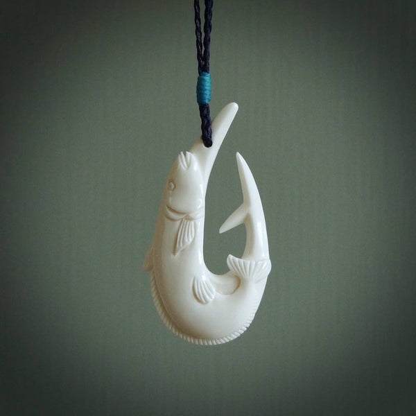 This is a beautiful bone carving pendant. We have designed a hook with a Kingfish motif especially for those lover of the ocean and all you fanatical fishermen out there. This piece is designed and made by NZ Pacific and is for sale worldwide.