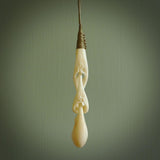 A wonderful, intricate pendant handcarved by Yuri in bone. A beautifully sensual and fascinating form that reflects the complexity and wonder of human relationships.