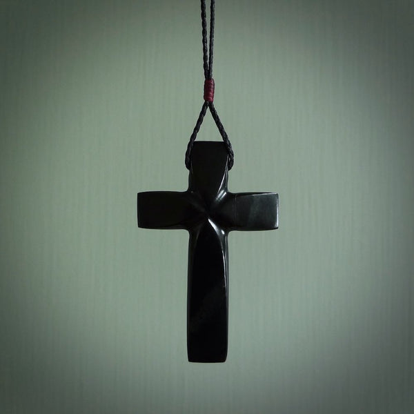 Hand carved black jade cross. Religious symbol pendant. Christian cross pendant for sale online.