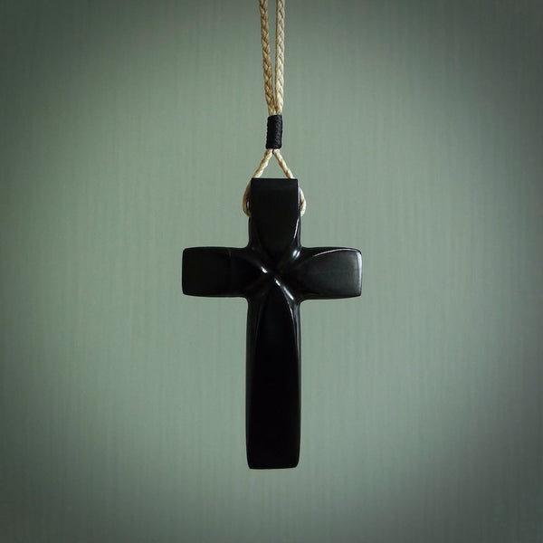 Hand carved black jade cross. Religious symbol pendant. Christian cross pendant for sale online.