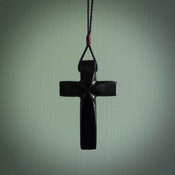 Hand carved black jade cross. Religious symbol pendant. Christian cross pendant for sale online.