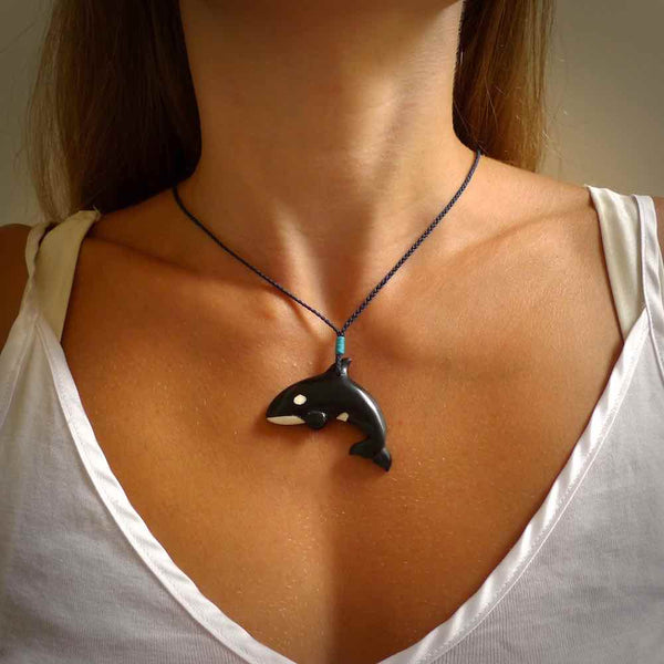 Hand carved black jade Orca pendant. Ocean themed pendants hand carved from natural materials by NZ Pacific. Unique handmade jewellery.