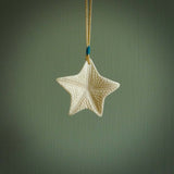 Hand carved bone starfish pendant. Ocean themed pendants carved by NZ Pacific. Moana pendants for sale online.