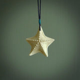 Hand carved bone starfish pendant. Ocean themed pendants carved by NZ Pacific. Moana pendants for sale online.