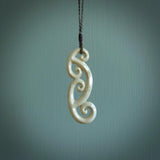 This is a wonderful, gently curved piece with a multiple koru design. We've carved this from deer antler and bind it on hand-plaited cords of various colours. Order yours now on NZ Pacific at www.nzpacific.com