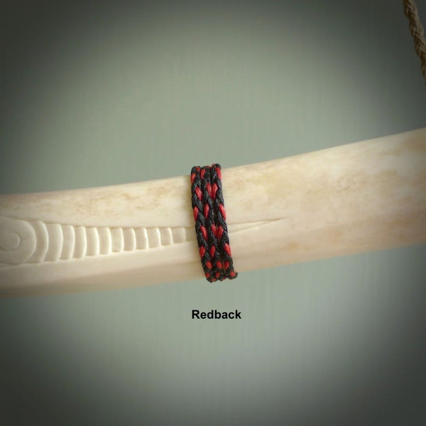 This shows a picture of our Redback hand plaited necklace cord.