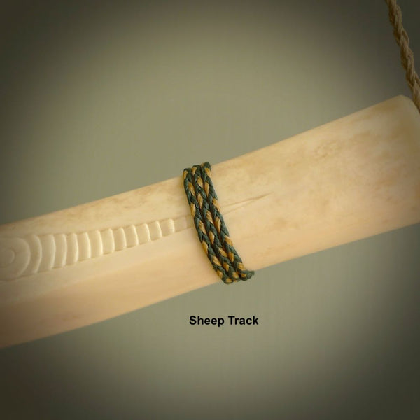 This shows a picture of our Sheep Track hand plaited necklace cord.