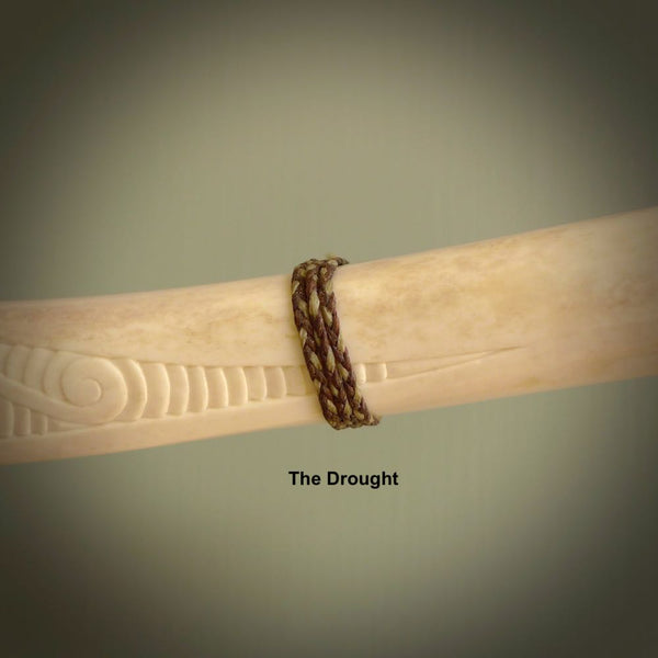 This shows a picture of our The Drought hand plaited necklace cord.