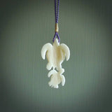 Pair of turtles hand carved in bone. Hand carved jewellery made by NZ Pacific and for sale online. Moana jewellery, handcarved in bone.