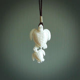 Pair of turtles hand carved in bone. Hand carved jewellery made by NZ Pacific and for sale online. Moana jewellery, handcarved in bone.