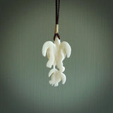 Pair of turtles hand carved in bone. Hand carved jewellery made by NZ Pacific and for sale online. Moana jewellery, handcarved in bone.