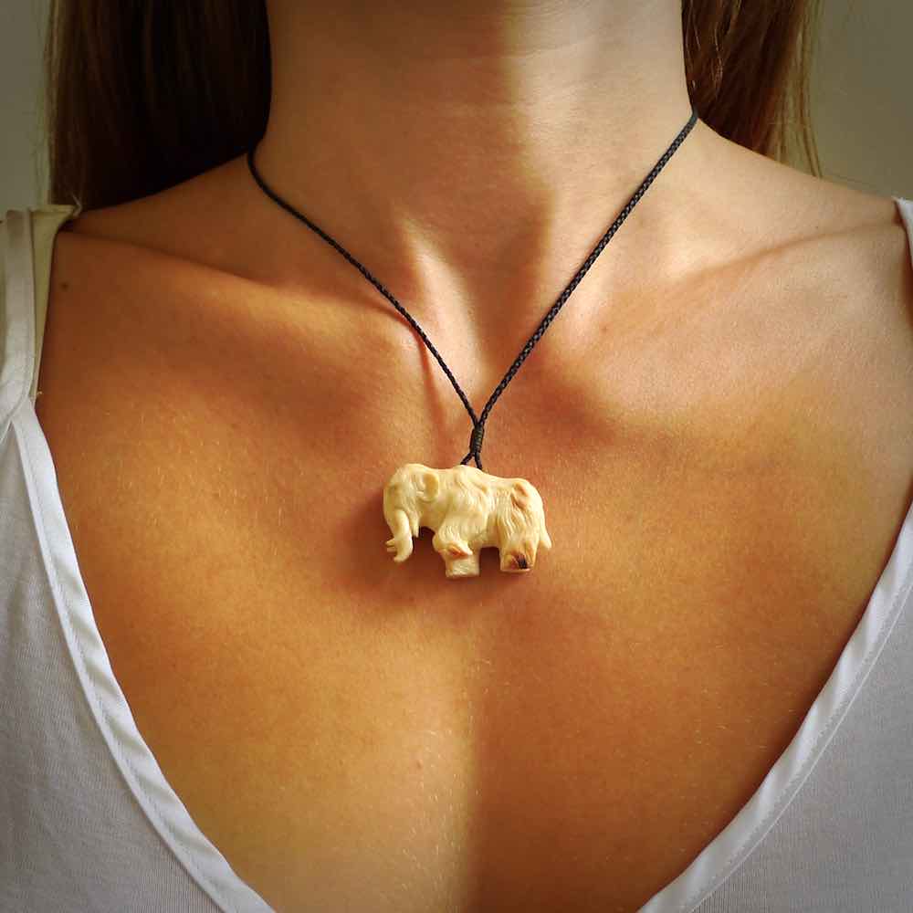 Hand carved woolly mammoth pendant. Carved from woolly mammoth tusk by NZ Pacific.