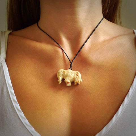 Hand carved woolly mammoth pendant. Carved from woolly mammoth tusk by NZ Pacific.