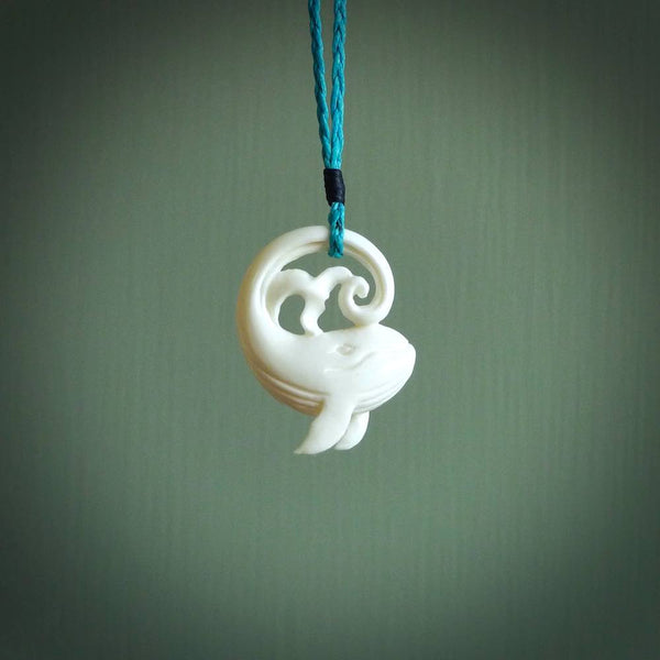 A hand carved bone whale pendant. This is a lovely piece carved to bring pleasure to the lucky wearer. It is a friendly pendant which we will ship to you free wherever you live. Carved by NZ Pacific and for sale online.