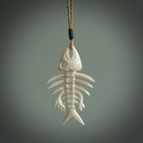 Hand carved bone fish skeleton pendant. Hand made bone fish necklace. Fish themed jewellery. Ocean themed pendant. One only necklace provided with adjustable cord and free delivery.