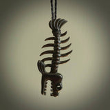 Hand carved Australian Black Jade fish skeleton pendant. Hand made black jade fish necklace. Fish themed jewellery. Ocean themed pendant. One only necklace provided with adjustable cord and free delivery.