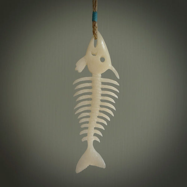 Hand carved bone fish skeleton pendant. Hand made bone fish necklace. Fish themed jewellery. Ocean themed pendant. One only necklace provided with adjustable cord and free delivery.