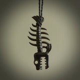 Hand carved Australian Black Jade fish skeleton pendant. Hand made black jade fish necklace. Fish themed jewellery. Ocean themed pendant. One only necklace provided with adjustable cord and free delivery.
