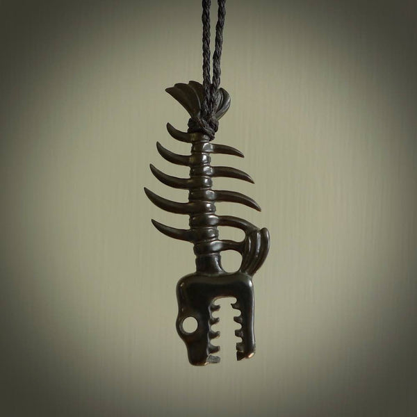 Hand carved Australian Black Jade fish skeleton pendant. Hand made black jade fish necklace. Fish themed jewellery. Ocean themed pendant. One only necklace provided with adjustable cord and free delivery.