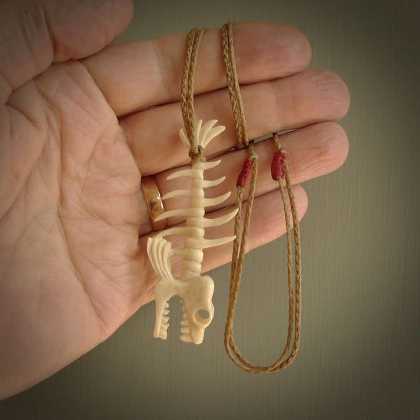 Hand carved bone fish skeleton pendant. Hand made bone fish necklace. Fish themed jewellery. Ocean themed pendant. One only necklace provided with adjustable cord and free delivery.