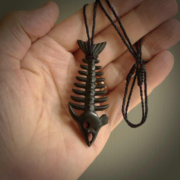 Hand carved Australian Black Jade fish skeleton pendant. Hand made black jade fish necklace. Fish themed jewellery. Ocean themed pendant. One only necklace provided with adjustable cord and free delivery.