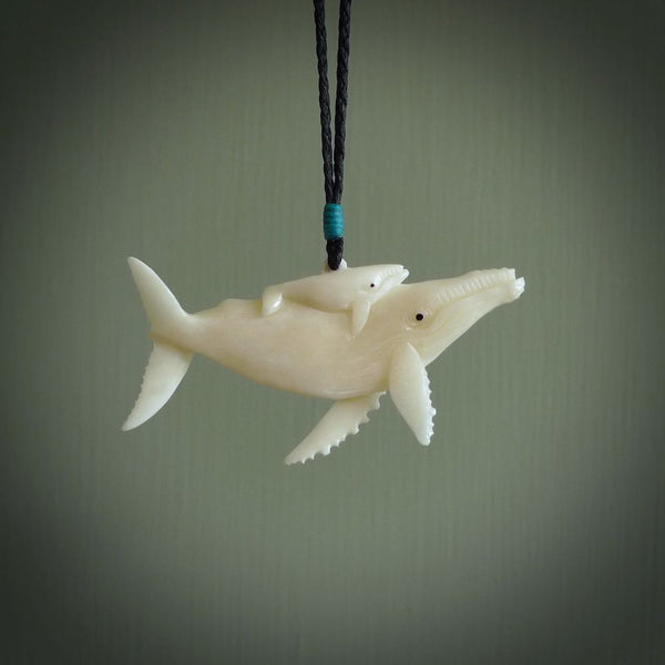 Hand carved bone whale pendant. Carved by NZ Pacific in natural bone. Hand made jewellery for sale online. A beautiful whale-themed pendant - Ocean Moana.