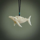 Hand carved bone whale pendant. Carved by NZ Pacific in natural bone. Hand made jewellery for sale online. A beautiful whale-themed pendant - Ocean Moana.