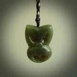 Hand carved New Zealand Jade Pounamu Wheku face pendant. Carved from New Zealand Jade by NZ Pacific. Hand crafted Jade jewellery for sale online. Pacific carving pendant, striking and unique delivered to you with Express Courier at no extra cost.